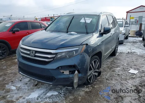 2017 Honda Pilot Touring z USA, uszkodzony, nr VIN 5FNYF6H95HB028638